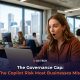 A business professional reacts with surprise at her laptop in a modern Australian office, representing the hidden data security risks businesses face when adopting Microsoft Copilot.