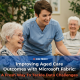 A smiling nurse talking with elderly residents in an aged care facility, representing improved outcomes through Microsoft Fabric.